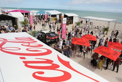 Coca-Cola curated its own food-fest-within-a-food-fest with a performance stage, pizza from Spris, cocktails, and popular straw hat swag.