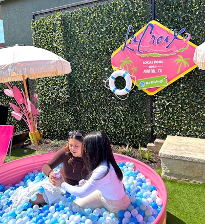 The bar focused on mocktails (no alcohol here!) using LaCroix flavors such as mojito-mint and guava. There was also an outdoor swag station covered in metallic and pastel tassels, which offered giveaways like pins, tote bags, and caps.