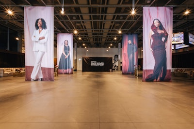 At Essence's Black Women in Hollywood Awards during Oscars week, dramatic, 24-foot draped portrait towers of the honorees hung from the ceiling.
