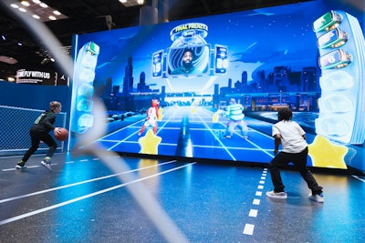 At NBA Crossover—a multiday family-friendly fan event held at the Indiana Convention Center during the 2024 All-Star Game in February—AT&T offered two immersive games highlighting the Eastern and Western conferences. Fans could experience the new immersive AT&T gameplay experience, Dribble Town, where avatars of iconic NBA players like Paul George acted as their guide and motivator throughout the game, offering real-time feedback and commentary. There was also AT&T Splashville (pictured), a virtual court experience; fans competed as their favorite Western Conference player, scored points, collected trophies, and raced against the clock for a chance to get their player into the NBA All-Star Game. Wasserman led project management, creative, production, and execution.