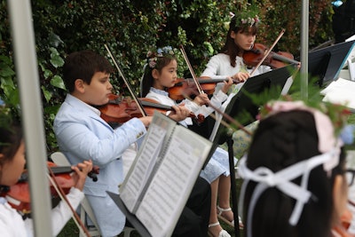 The Westside Youth Orchestra—all decked out in smart-looking Janie and Jack looks—performed for the crowd.