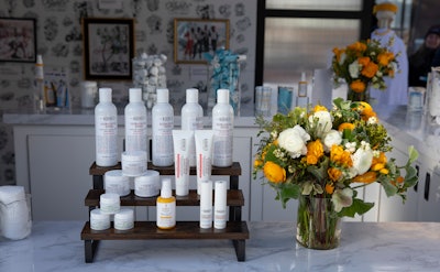 Kiehl's products including Ultra Facial Barrier Balm, Ultra Facial Cream, Avocado Eye Cream, Creme De Corps, Ultimate Strength Hand Salve, Lip Balm #1, and Super Fluid UV Defense were on display.