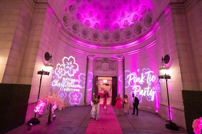 A pink carpet and colorful projections welcomed guests through Union Station's dedicated entrance for private events.