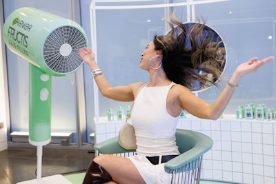 A giant working hair-dryer delivered windblown looks for a dramatic photo moment.