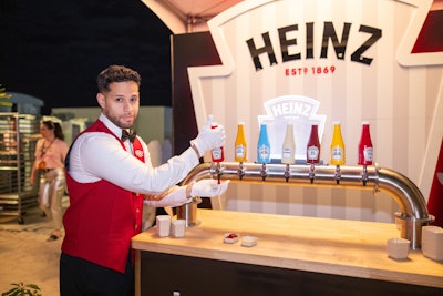 Presenter Heinz served French fries to top at a custom sauce bar with up to seven products, including ketchup, ranch, mayonnaise, and mustard.