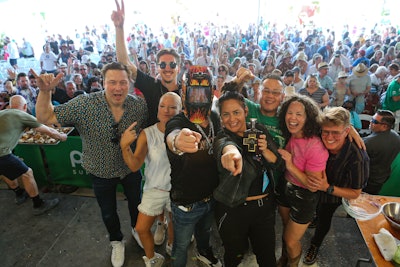 Celebrity chefs Rocco DiSpirito, Hunter Fieri, Tiffani Faison, Guy Fieri (in a flame-resistant mask), Antonia Lofaso, Jet Tila, Stephanie Izard, and Crista Luedtke posed after a lively day of cooking demos at Saturday's Grand Tasting.