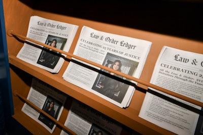 A newsstand was stocked with custom Law & Order Ledger newspapers.