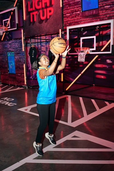 Hoopers of all ages could take to the Light It Up court for an electrified shooting challenge inspired by the all-electric Nissan ARIYA. Attendees could light up the 'city skyline' in their school colors after each bucket made.