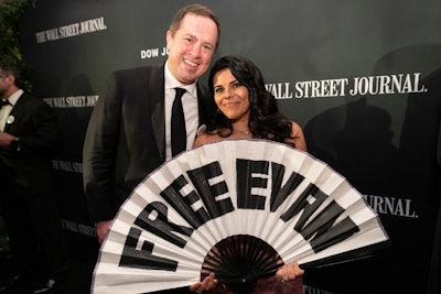Guests could also pose in front of a branded step-and-repeat. Some held up fans reading 'Free Evan.' Evan Gershkovich is a Wall Street Journal reporter who has been detained by the Russian government since March 2023. His arrest for espionage charges has been widely condemned by the Biden administration, press-freedom groups, and news organizations.