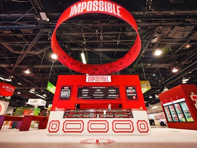 Impossible partnered with experiential creative agency Yes Creative Co to design a booth that transported people into a classic butcher shop, complete with refrigerated deli cases housing its plant-based products in the new red packaging, along with iconography and signage that was inspired by hand-painted market and butcher signs. Impossible's new brand palette, which mirrors the progression of a burger's cooking stages (rare, medium, well-done, and charred), was also used throughout the space. Nearly 31,000 samples were handed out over the course of four days.