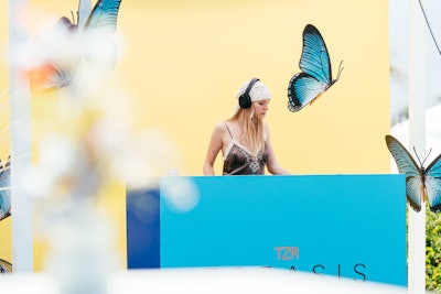 DJ Miss Maddi Jean (Maddi Jean Waterhouse) played a special set surrounded by hanging butterflies. The event featured audio by Pro Systems, fabrication by 3 Line, catering by F10, and furniture by Taylor Creative and FormDecor.