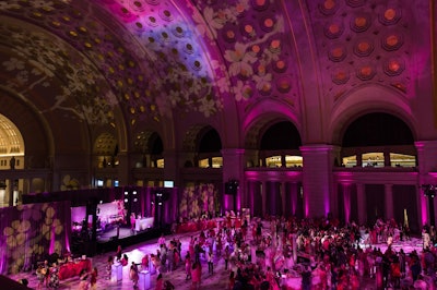 In March, Washington, D.C.'s iconic Union Station went pink for the evening. The busy train station played host to the Pink Tie Party, the annual signature event of the National Cherry Blossom Festival. Appropriately pink lighting and floral projections made an impact on the massive space's ceiling. Design Foundry handled decor, while 4Wall Entertainment handled lighting. See more: How D.C.'s Cherry Blossom Festival Took Over the City's Busy Union Station for an Evening
