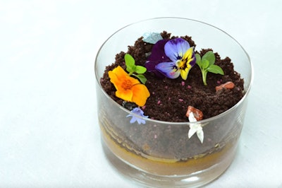 At a black-tie gala for Shedd Aquarium in Chicago, guests dined on an edible terrarium dessert, prepared by Sodexo, with chocolate mousse, mango, cake “dirt,” edible flowers, chocolate rocks, rose crystals, pink guava sorbet, and raspberry-infused chocolate twigs.