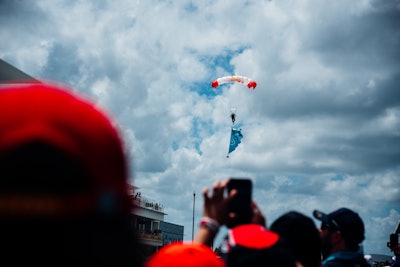 The Red Bull Parachute Jump preceded Marc Anthony's delivery of the national anthem ahead of the Sunday Grand Prix.