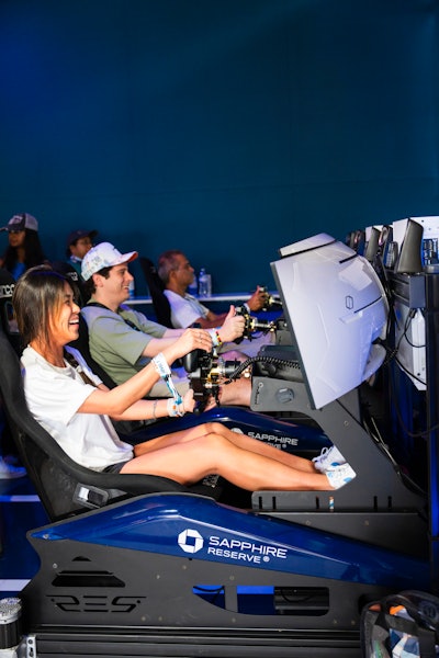 Cardholders could get into the spirit with these race simulators, a popular activity within the space.