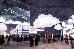 The event space was inspired by NYC above the clouds, as seen through the black-and-white coloring and LED screens displaying the tops of iconic buildings. Signage also displayed “/imagine,” which was meant to be symbolic of an artificial intelligence command to serve as “a metaphor for what we can achieve together,' according to executive producer Lindsay Carroll.