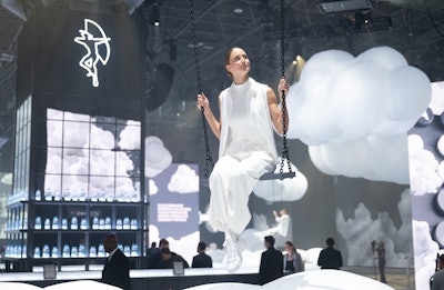 Performers dressed in all white swung above inflatable clouds were peppered throughout the 30,000-square-foot space.