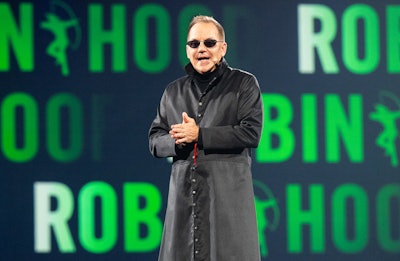 Billionaire hedge fund manager Paul Tudor Jones delivered heartfelt remarks while wearing a black cloak reminiscent of Neo, played by Keanu Reeves in The Matrix series.