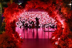 An expansive pathway inspired by Korean gardens guides guests through an LED experience that depicts florals growing, blooming, and fading away in an ever-evolving cycle.