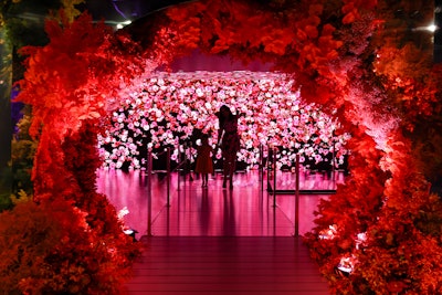 An expansive pathway inspired by Korean gardens guides guests through an LED experience that depicts florals growing, blooming, and fading away in an ever-evolving cycle.