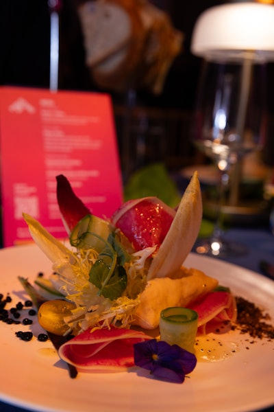 The 'Pillow Salad' included puffed bread, pea tendrils, fennel “dirt,” watermelon radish, cucumber, tomatoes, endive, whipped sheep’s milk ricotta, balsamic pearls, and a limoncello vinaigrette.
