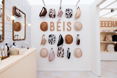 Western-themed backdrops with strategically placed BÉIS luggage provided an on-theme setting for photos and social media posts. BÉIS also provided giveaways including branded bandanas and keychains.