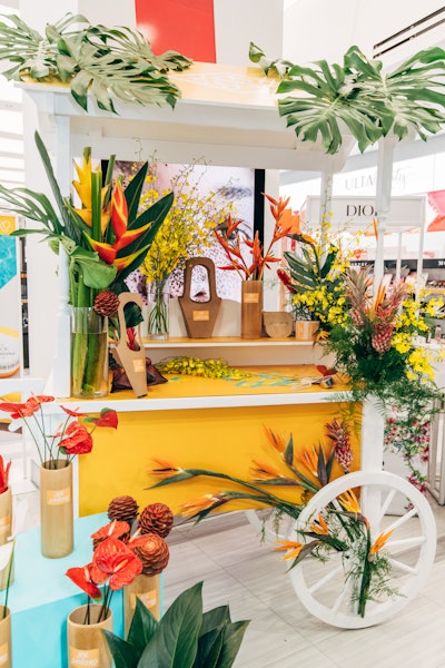 Ulta’s NYC outpost, where the pop-up took place, was decked out in a floral, SDJ-branded arch that set the tropical tone for the rest of the experience. Roughly 2,100 New Yorkers walked under the arch, according to PopUpMob, the local marketing firm that was behind the concept and design of the activation. Fellow New York firm Argon Props handled execution.