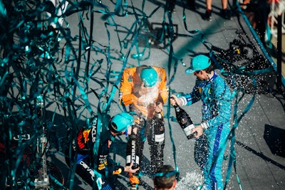 Lando Norris, Max Verstappen, and Charles Leclerc kicked off the Miami Grand Prix after-party with a Ferrari Brut sparkling wine spray and confetti streamers.