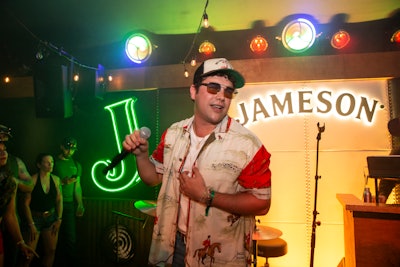 Attendees could escape the heat with four Jameson cocktails on draft, alongside Jameson's three signature canned cocktails, and enjoy live musical performances from the likes of Austin Mahone (pictured). The space was produced by 160over90.