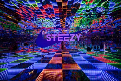 Also at Coachella 2024, STEEZY—an online platform for dance enthusiasts—celebrated its partnership with Nike through the STEEZY 'House of Reflections,' sponsored by Nike Air Max. The activation took the form of a massive shoe box; inside, the immersive experience provided performers and dancers with a colorful, infinity room-like setting for self-expression and content creation.