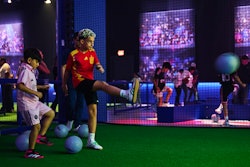 In the interactive fan zone, visitors can test their ball skills and learn tips and tricks from Messi.
