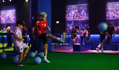 In the interactive fan zone, visitors can test their ball skills and learn tips and tricks from Messi.