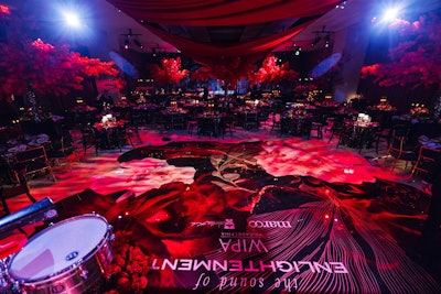 SHOUT! created a custom dance floor wrap that evoked the event's bold floral design.