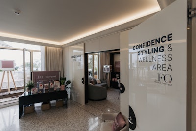 A studio and production booth were built for one-on-one interviews; there was also a lounge area, a charging station, and a snack station in collaboration with Uber. Also on site? 'Confidence styling' by IPSY, plus a professional headshot station.