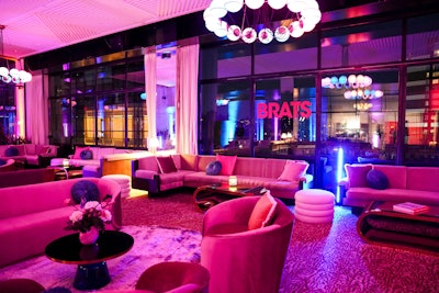 The event, produced by Mirrored Media, featured colorful, nostalgic interior design, including plush seating, retro art prints, LED accents, floral extravaganzas, and shaggy rugs. Every guest had the opportunity to convert their outfits into on-theme looks with stick-on patches.