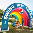 At Lollapalooza 2019, Pepsi offered shade under a giant prop rainbow. Guests could also swing under cloud-shaped balloons. See more: Lollapalooza 2019: Inside Guest-Focused Brand Activations from Brands Like Pepsi and Cupcake Winery