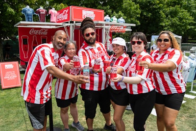 Highlights included an immersive robot camera opportunity, MLS legend appearances, a Coke Studio listening booth, custom graffiti soccer balls, and Coca-Cola product sampling. In collaboration with MLS, the Beats, Cleats & Eats Concert featured upcoming neo-soul and alternative music artist chlothegod.