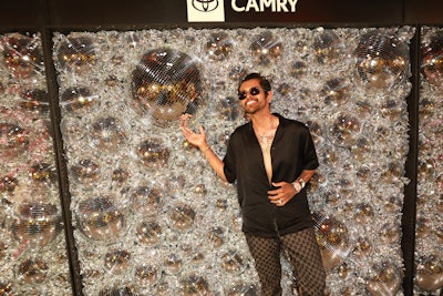 Guests could also pose in front of a disco ball-covered wall.