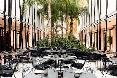 The installation includes covered walkways with fans and a retractable canopy and features Bal Harbour Shops’ signature palm tree motif and monstera leaf design. Koi ponds, fountains, and planters filled with lush greenery help bring the chic Miami vibes to other locations.
