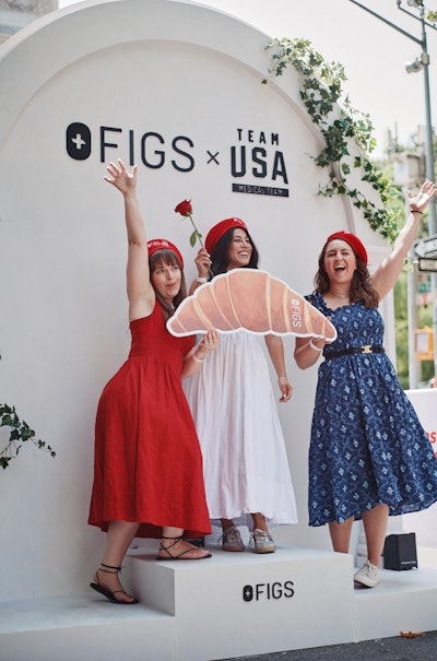 Visitors posed on an Olympic-style podium.