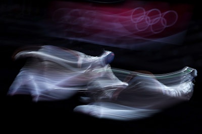 Luigi Samele of Team Italy and Aron Szilagyi of Team Hungary competed in the Men's Sabre Team Semifinal at the 2020 Olympic Games, captured by photographer Patrick Smith.