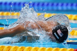 In this photo by photographer Clive Rose, Caeleb Dressel of Team United States competes in the second semifinal of the Men's 100-meter Butterfly at the 2020 Tokyo Olympic Games.