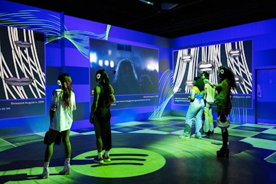 In one room, projection mapping showcased iconic concert moments, while another room spotlighted classic ‘90s sitcoms from the Max library. In a third space, various film and TV scenes were paired with music videos of the songs being played in the scenes. Guests could learn about the creative process behind the pairings.