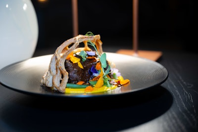 Dishes included a beef bourguignon wellington with beef, short rib, bourguignon demi, carrot parsnip puree, wild mushrooms, and haricots verts.