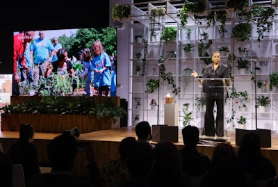 A more subtle take came from The Wall Street Journal's Future of Everything Festival, held in May 2023 in New York. The festival's plant-covered main stage hosted high-profile speakers like former First Lady of the United States Michelle Obama (pictured). The stage was later upcycled through a partnership with New York's GreenThumb; the day after the festival, the WSJ team reassembled the stage to create a shade structure and trellis at Hart to Hart Community Garden in Brooklyn, where it still stands. See more: Inside The Wall Street Journal's Innovative Event Sustainability Strategies