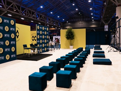 The stage area featured comfortable seating where attendees listened to author panels and other guest speakers.