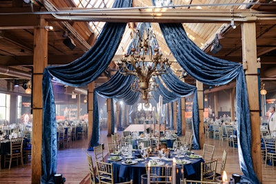 This year's Steppenwolf Gala in Chicago celebrated the Steppenwolf Theatre Company's 'bold, irreverent, and rock ’n’ roll style of work and play,' according to the ensemble's artistic directors Glenn Davis and Audrey Francis. Here, strategic draping down a row of tables lent to the event's steampunk aesthetic. Jeffrey Foster of Frost Chicago handled design and decor for the event.