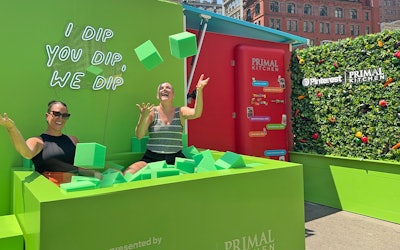 Visitors jumped into a “dip pit” filled with foam blocks in Flatiron Plaza.