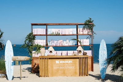 Upon arrival at the marina, guests were greeted by a branded LoveShackFancy x Stanley ice cream truck before entering a beach party complete with a “Beach Boutique' and branded beach games.