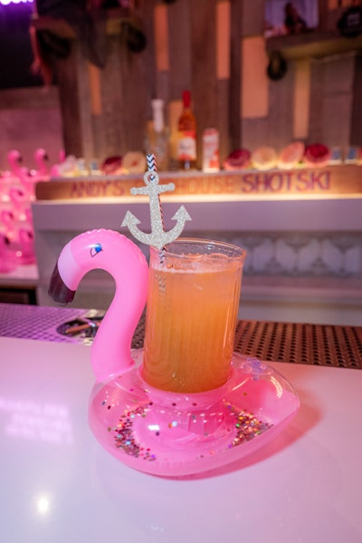 The event serves cocktails in mini flamingo pool floats, inspired by The Real Housewives of Miami.